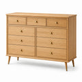 Commode en bois avec poignées dorées